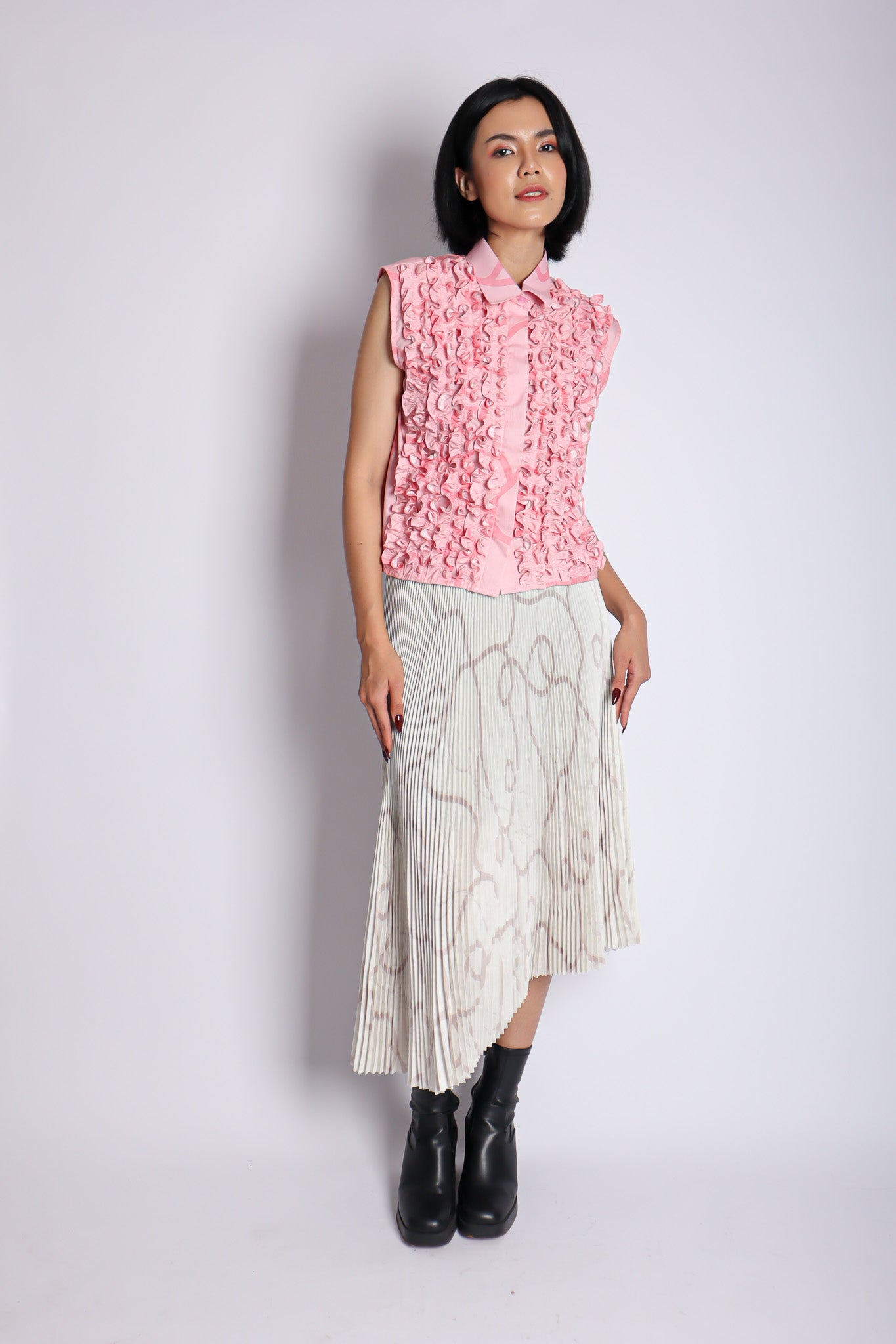 CALLA X ADINIA ASYMMETRIC PLEATS SKIRT IN IVORY