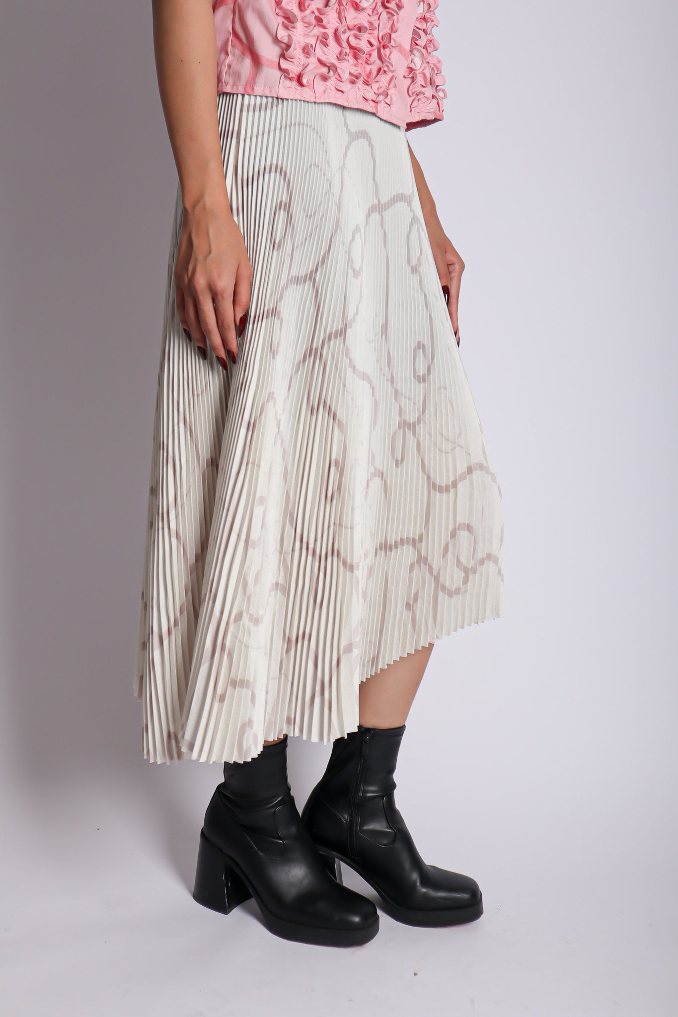 CALLA X ADINIA ASYMMETRIC PLEATS SKIRT IN IVORY