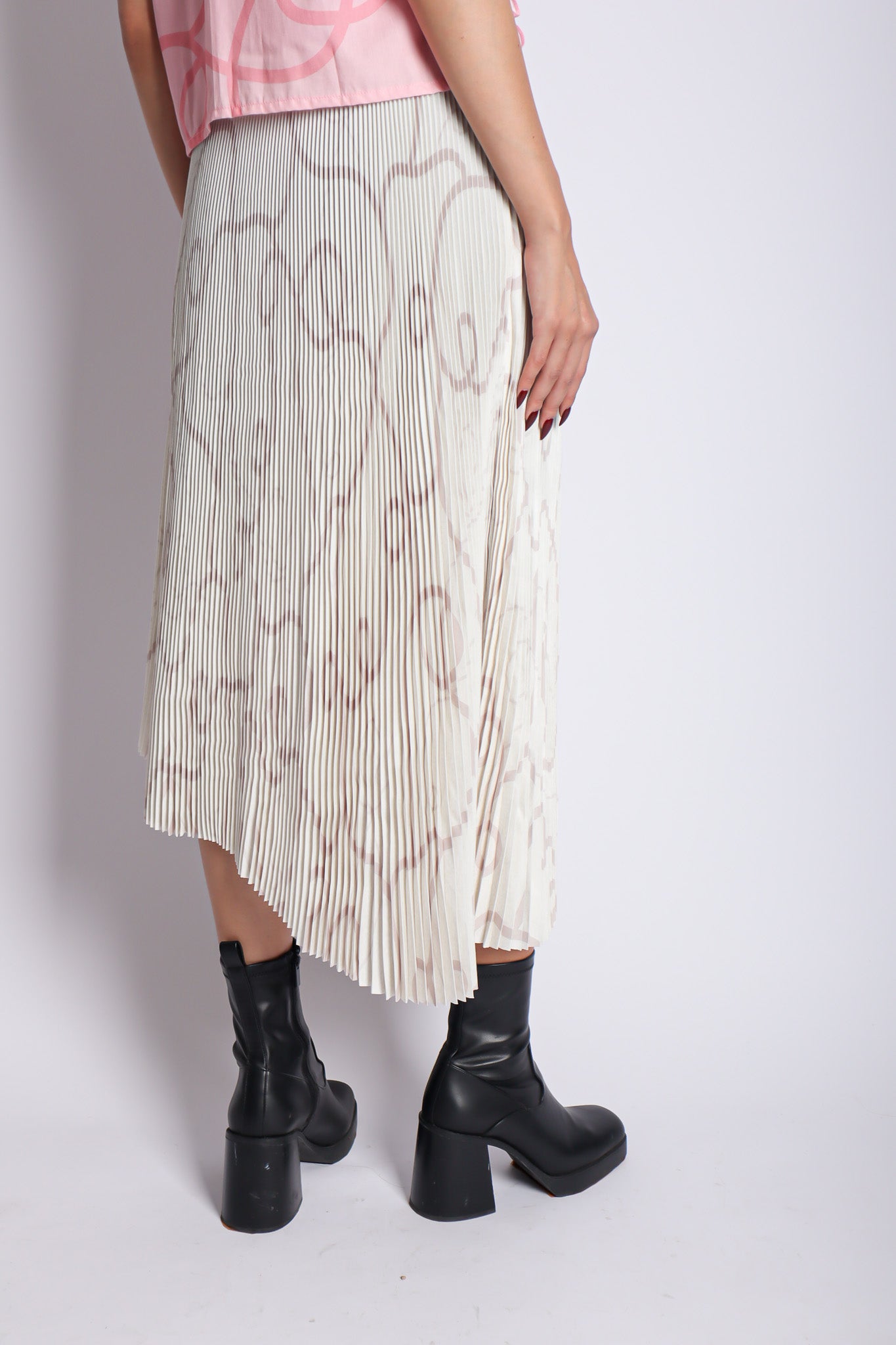 CALLA X ADINIA ASYMMETRIC PLEATS SKIRT IN IVORY